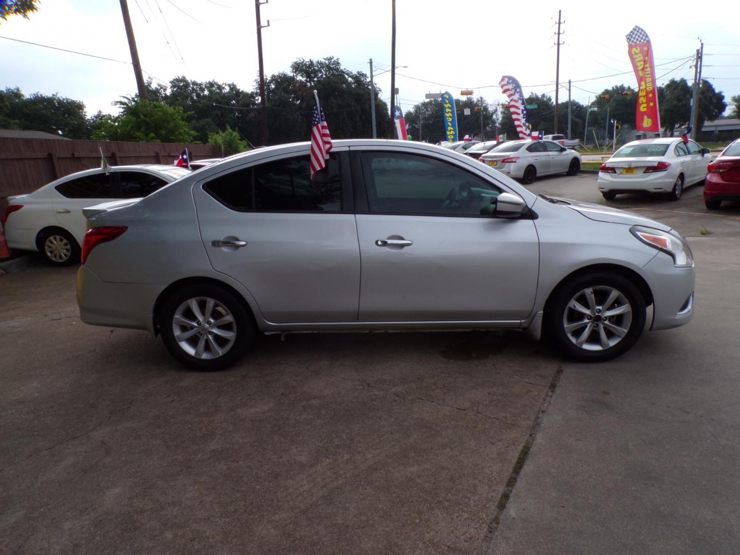 2017 Gray Nissan Versa 1.6 S 4A (3N1CN7AP5HL) with an 1.6L L4 DOHC 16V engine, 4A transmission, located at 16710 Clay Rd., Houston, TX, 77084, (281) 859-7900, 29.834864, -95.656166 - Low Down. Low Payments. - Photo#1